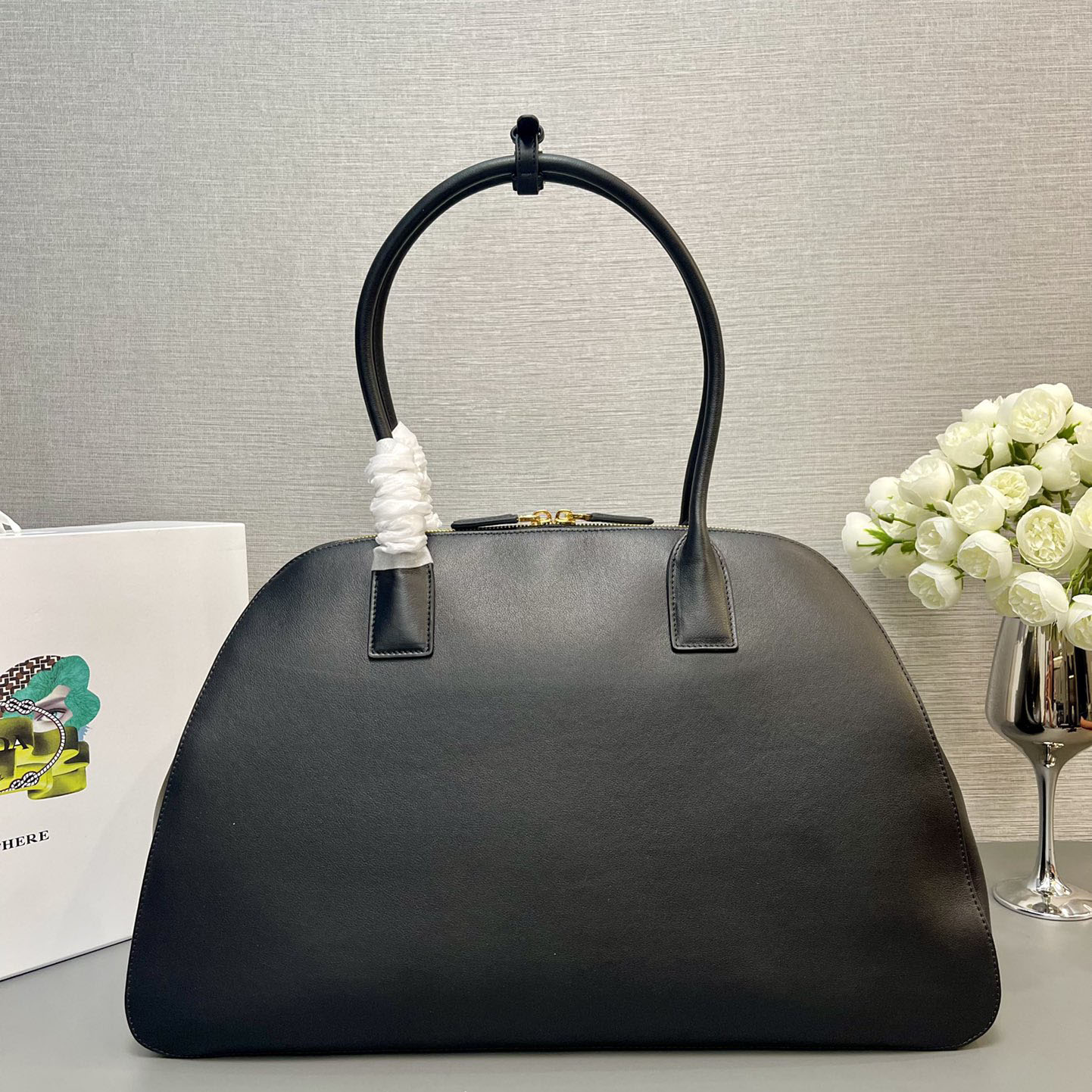 Pra*a top handle bags